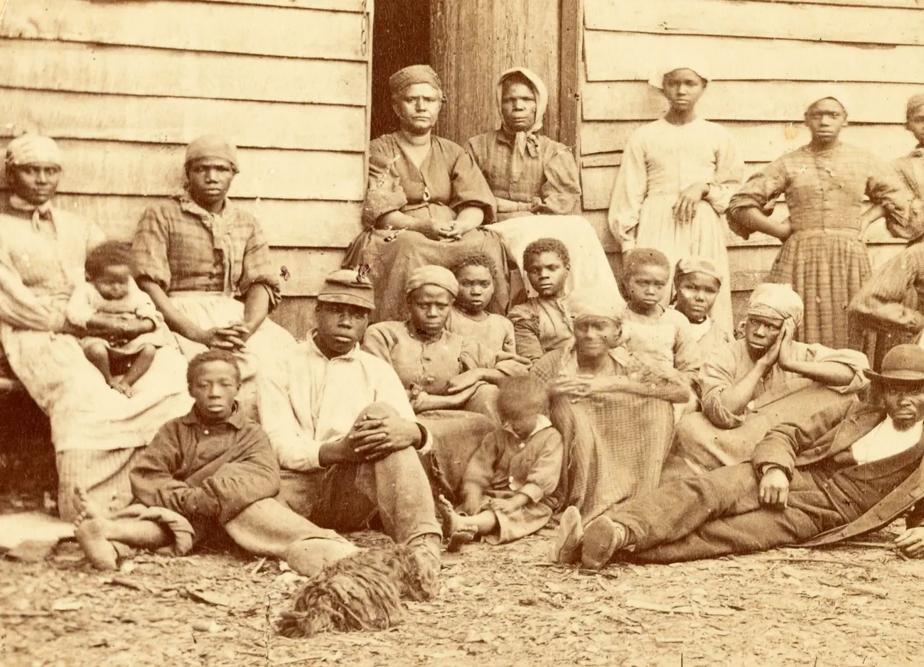 Formerly enslaved Black Americans celebrating freedom after the Civil War