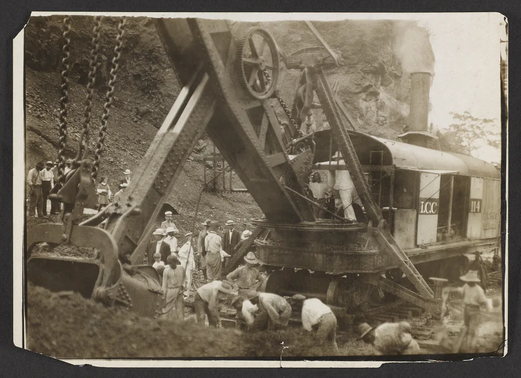 President Theodore Roosevelt seated on a steam shovel at Culebra Cut during his 1906 inspection of the Panama Canal construction