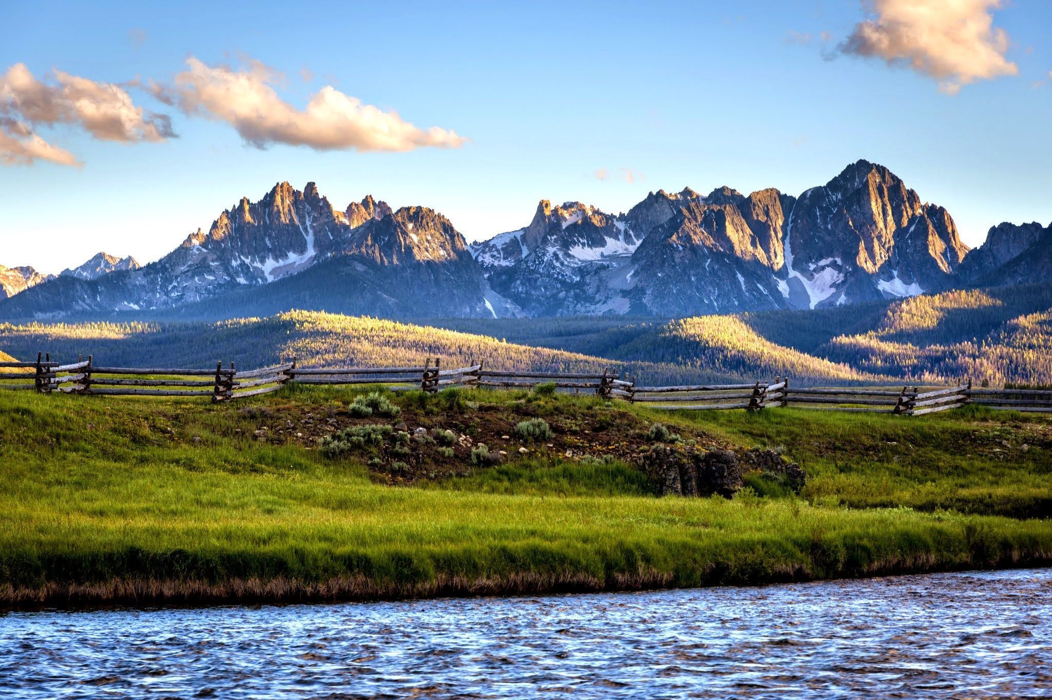 Jagged Sawtooth Mountain peaks reflected in a high alpine lake in central Idaho