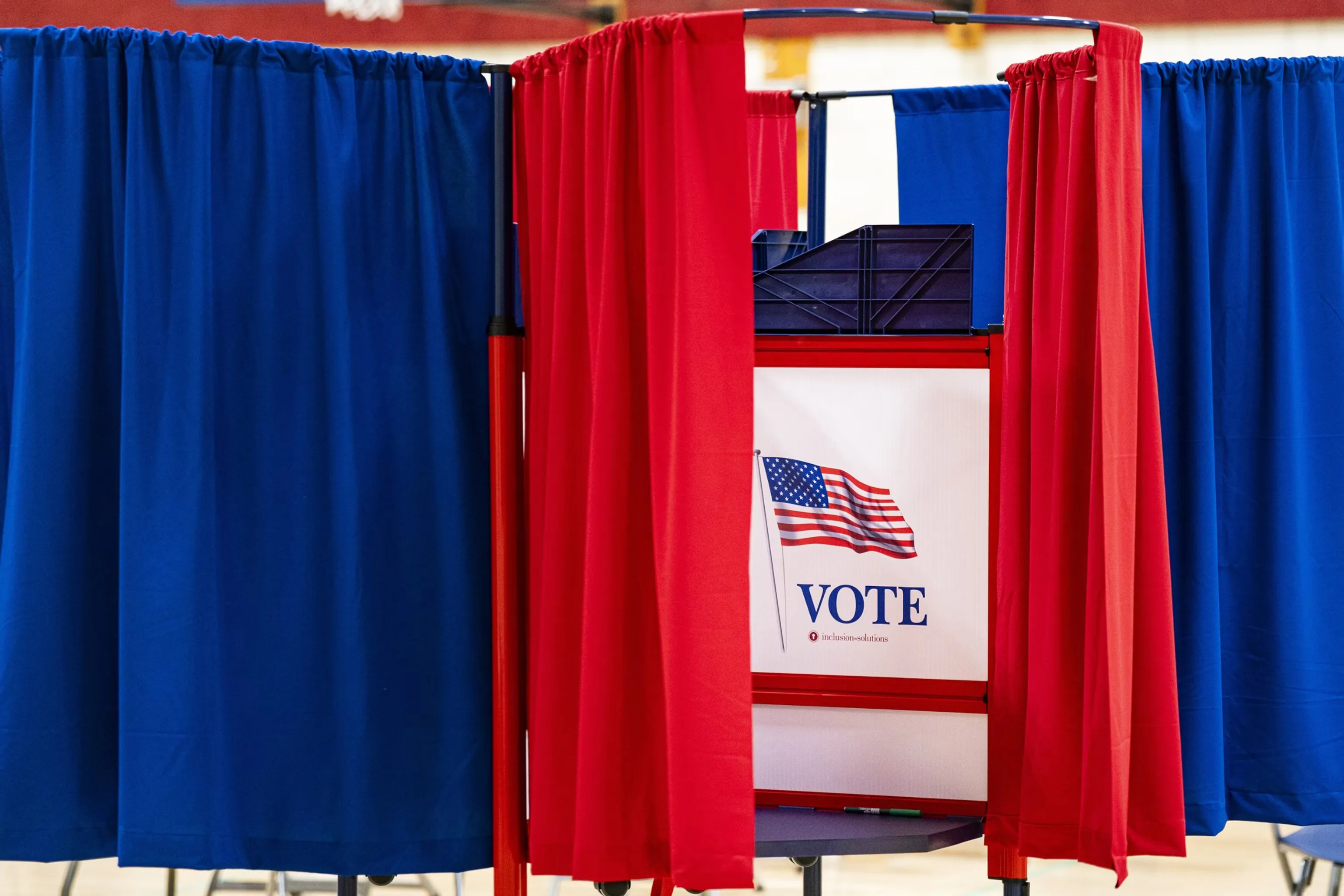 Rows of voting booths in the United States